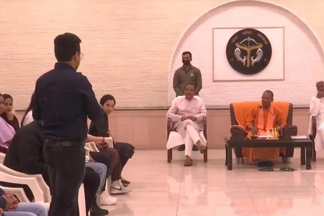 Yogi Adityanath interacts with students returning from Ukraine