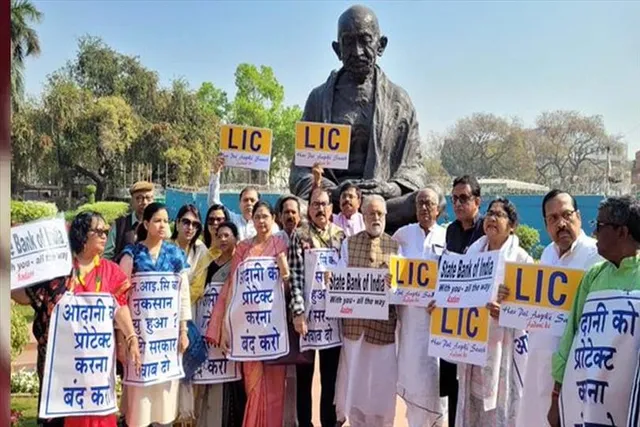 TMC MPs hold a protest at Parliament on Adani issue