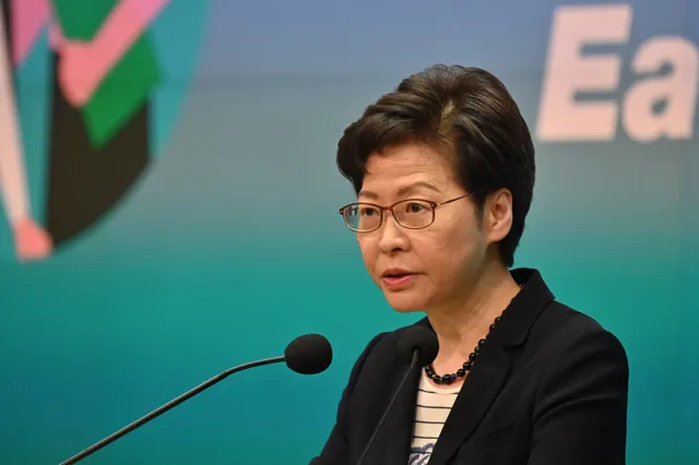 HK leader Carrie Lam defends arrests and seizure in Apple daily
