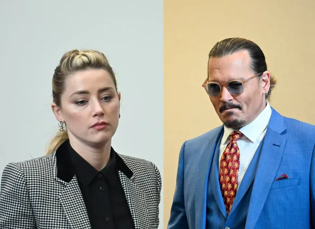 Amber Heard trial: Johnny Deep hugs his lawyer after a closing argument.