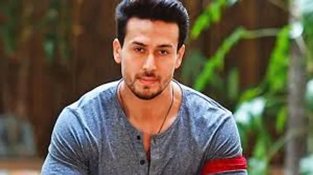 Tiger Shroff stays suave and cool amidst danger in the newest Heropanti 2 poster!