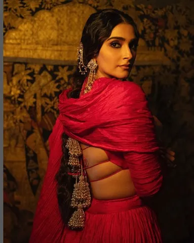 Sonam Kapoor goes vibrant in red as she blends traditions with style