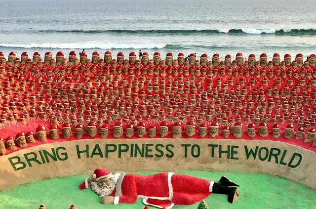 Odisha sand artist Sudarsan sculpts 1,000 Santa Clauses, sets world record