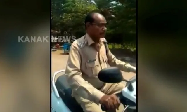 Watch Video: Odisha cop fined for driving sans helmet, clip goes viral