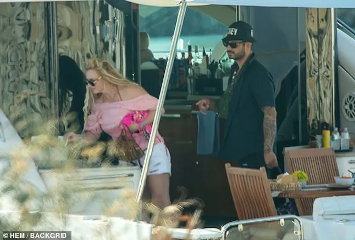 Britney Spears looks disheveled as she steps out with mystery man amid  widespread fears for her health | Daily Mail Online