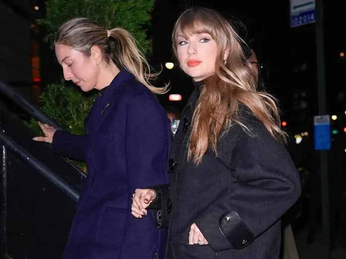 Taylor Swift steps out in all-black ensemble for dinner with Este Haim in  New York