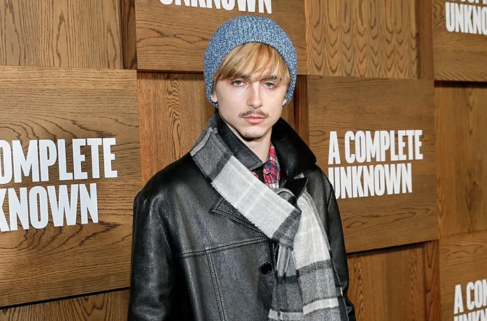 Timothée Chalamet Channels Bob Dylan Blonde Look at Biopic Premiere