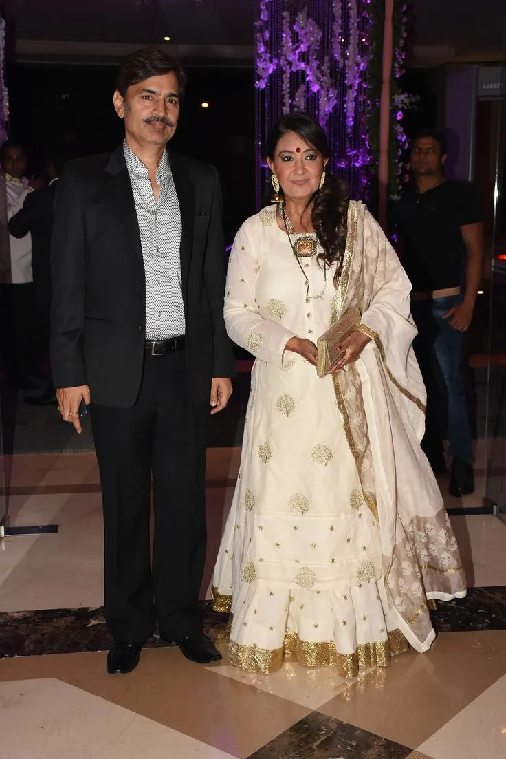 JASPINDER NARULA WITH HER HUSBAND