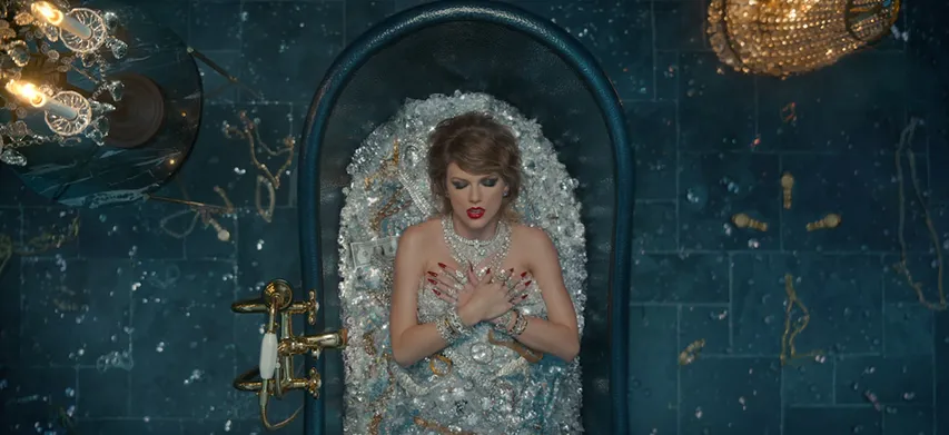 DONE READING BETWEEN THE LINES? IT'S NOW TIME TO LOOK AT TAYLOR'S OUTFITS IN LWYMMD