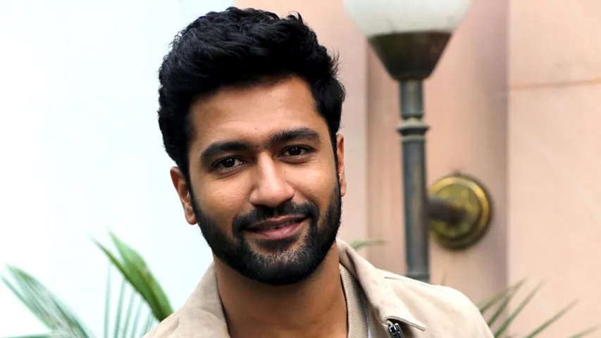 The bride was adamant on taking a photo with Vicky Kaushal, the groom kept waiting