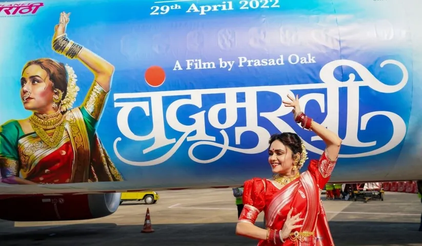 Amruta Khanvilkar takes the internet by storm and is the first-ever Marathi actor to have her poster on an aircraft!