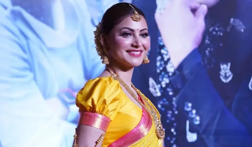 At the trailer launch of her Pan India film, Urvashi Rautela looks stunning as she talks about her love for Dhoni & Rajinikanth