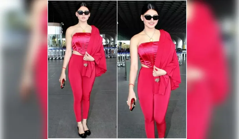 Urvashi Rautela Giving Red Chilli Vibes In This Red Corset Dress As She Gets Clicked By The Shutterbugs At The Airport