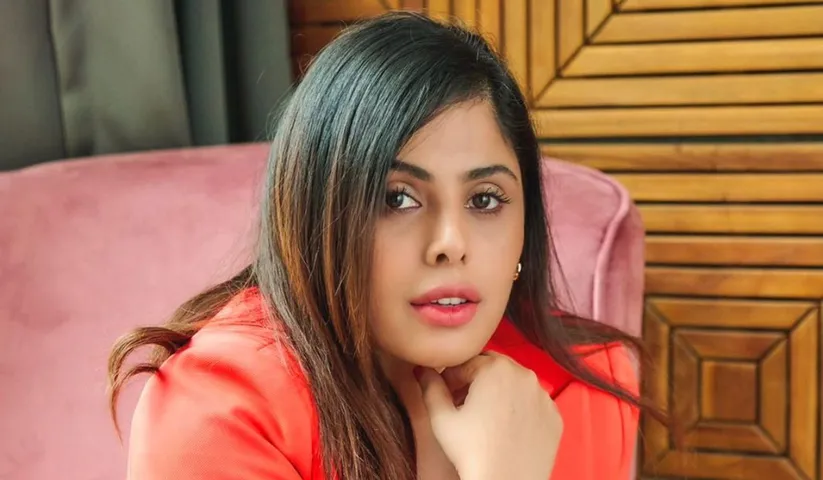 Actress Sehnoor Ace the Boss Lady vibes in this stylish, bold orange pantsuit: Check out now!