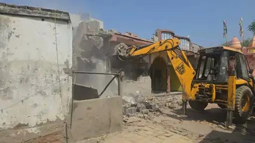 Bulldozer action on notorious bootlegger’s illegal property in Ahmedabad