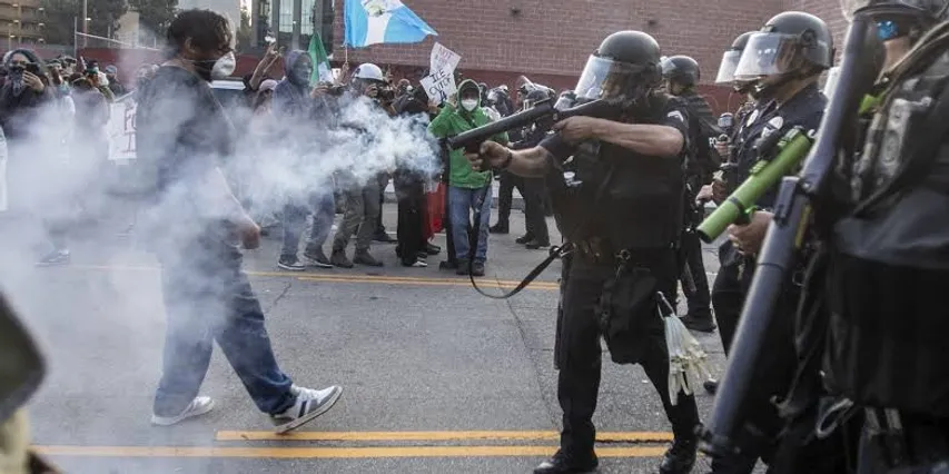 Protester pulls gun as ICE raid turns violent in California