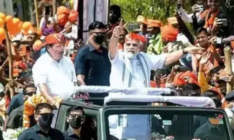 V for Victory and Vikas, says Modi in poll-bound Gujarat