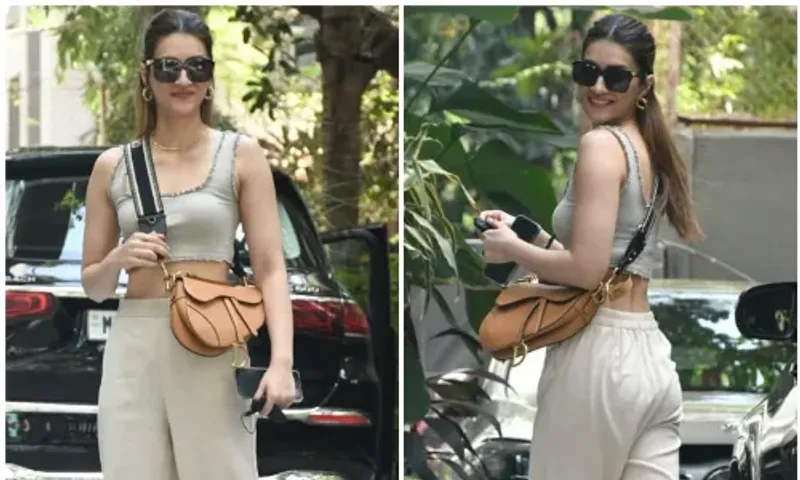 Kriti Sanon aces the street style look in tonal crop top and pants with a Dior saddle bag