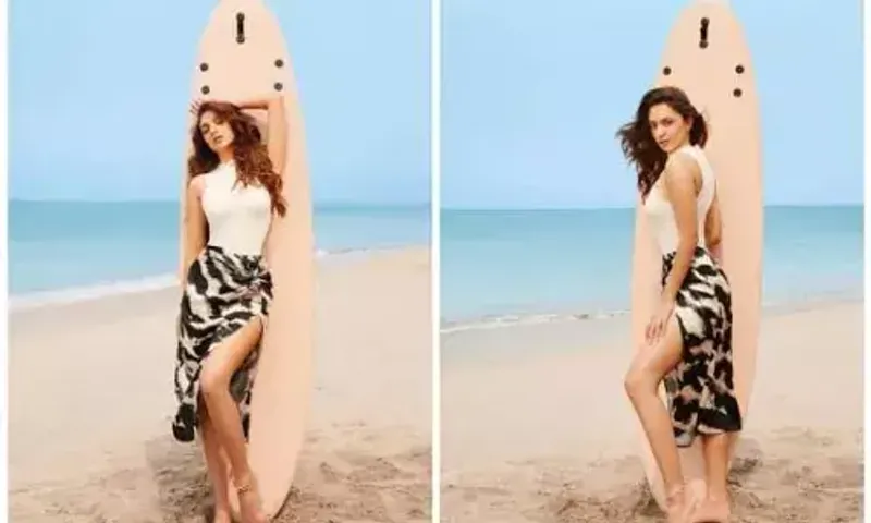 Kiara Advani rocks the beach look with a surfboard