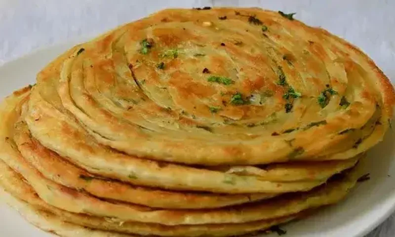 Chilli Garlic Paratha Recipe: If you like to try out new and unique recipes at home, then make sure you bookmark this recipe right away