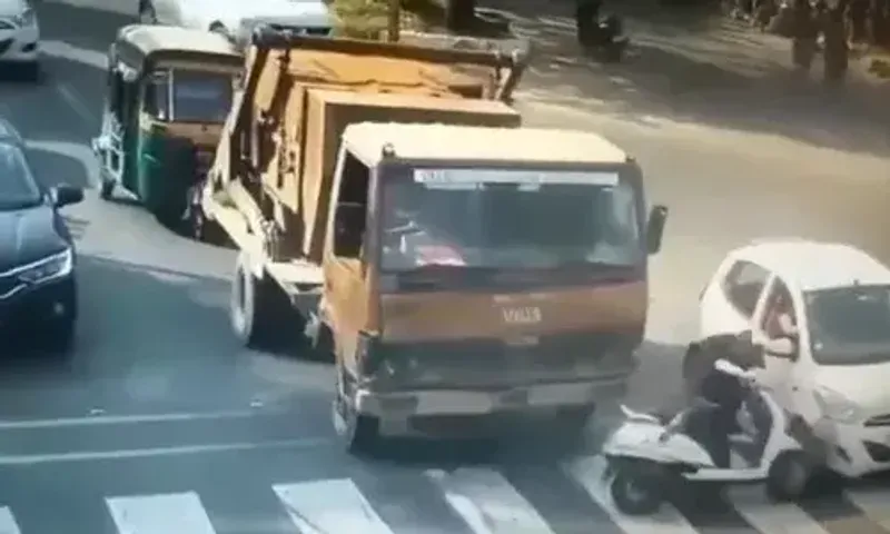 Vadodara city police shared video of girl crashed into a moving car at a traffic signal