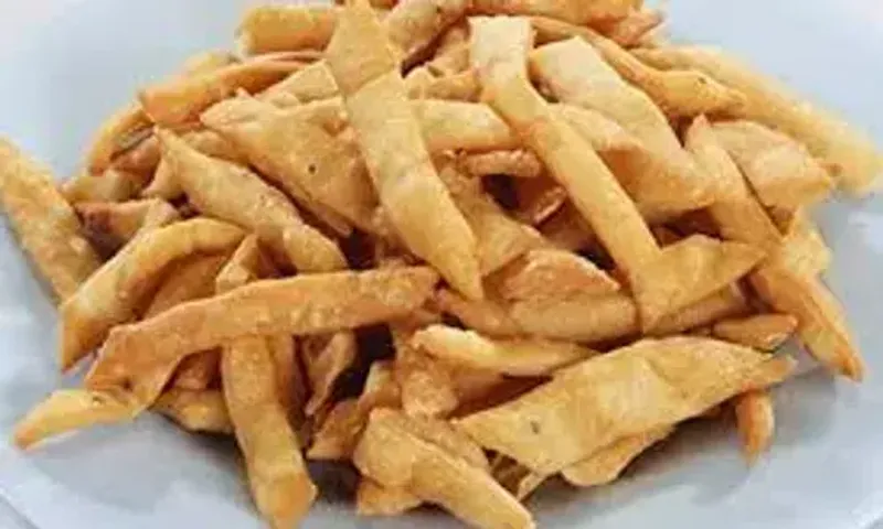 Palak Namak Pare Recipe: Woo, your loved ones with your exceptional culinary skills and we bet they will shower you with praise