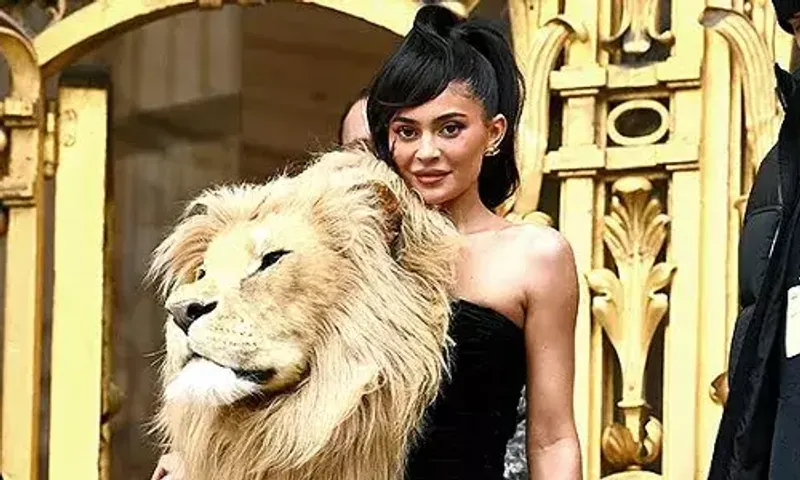 Kylie Jenner wears huge lion head gown to Paris fashion week