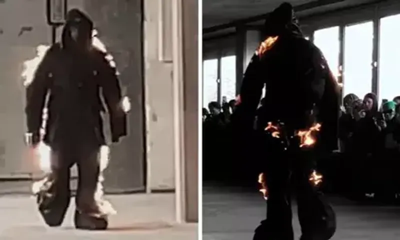 Model at Paris Fashion Week walks the ramp engulfed in flames