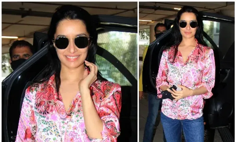 Shraddha Kapoor makes casuals look lovely with a satin printed shirt and denim