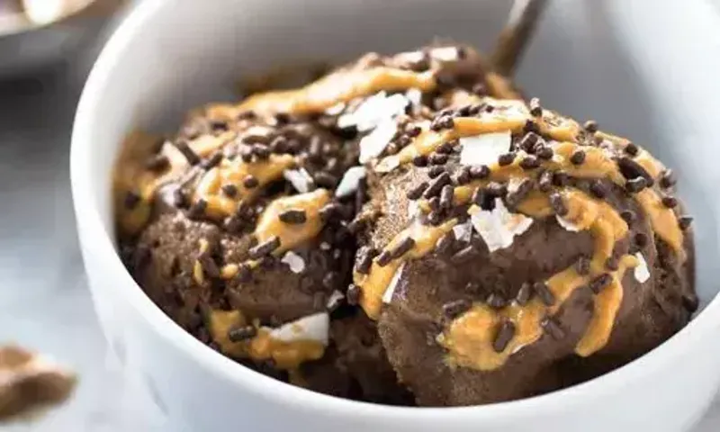 Vegan Ice Cream with Banana and Choco Chips Recipe: A perfect summer recipe and is best enjoyed when paired with hot and sizzling brownie