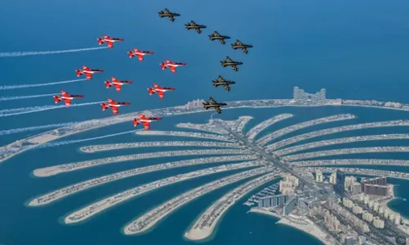 Indian Airforce Suryakiran Aerobatics Team and UAE's Al Fursan Display Team fascinating flypast at Dubai Air Show 2021