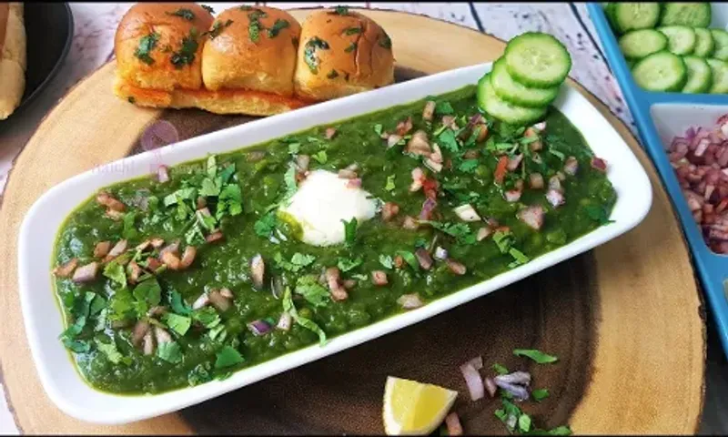 A hearty, delightsome, flavorful meal of mashed green vegetables, street Style Hariyali Pav Bhaji / Green Pav Bhaji