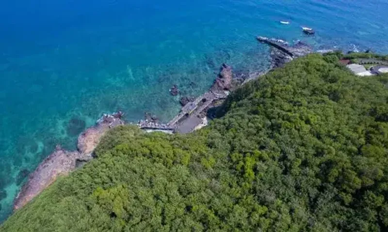 Covid outbreaks in China's summer vacation hotspots leave thousands stranded