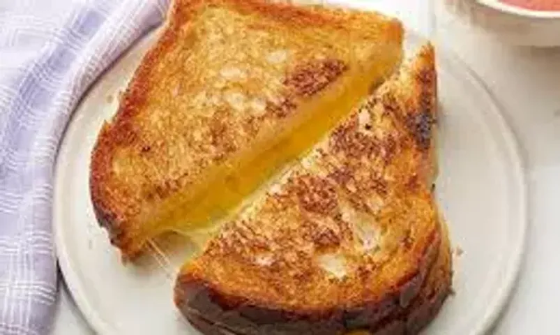 Cheddar Cheese Crust Sandwich Recipe:This sandwich would be your favourite on-the-go breakfast