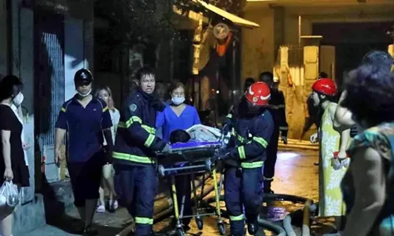 A fire that burned in a 9-story apartment building in Vietnam's capital has killed about 12 people