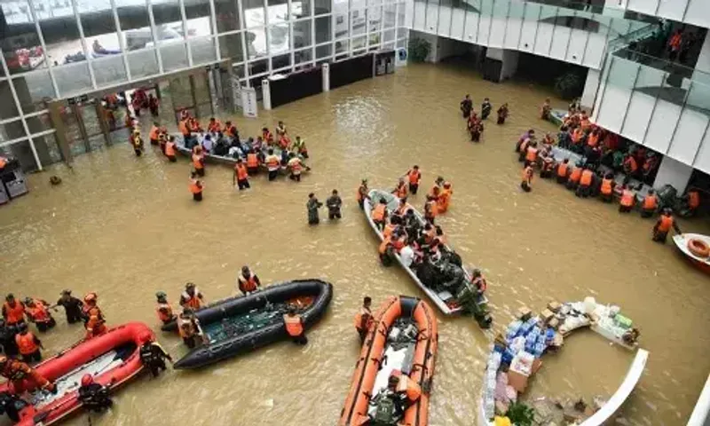 Death toll from China's Henan floods jumps to 302, up from 99 last week
