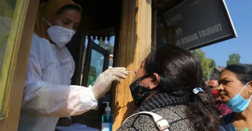 India records 8,318 new COVID-19 cases