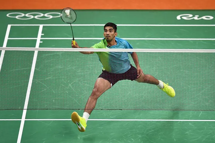 Srikanth and P.V Sindhu kept India's medal hopes alive by entering the quarter-finals, as boxer Vikas Krishan Yadav crashed out