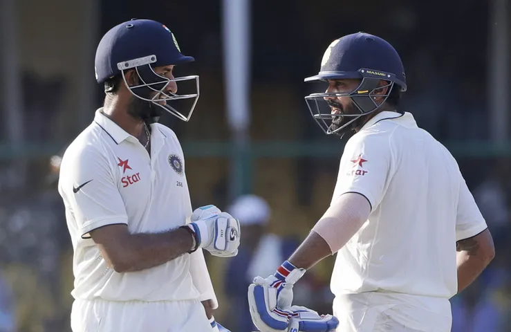 Vijay, Pujara lead India reply