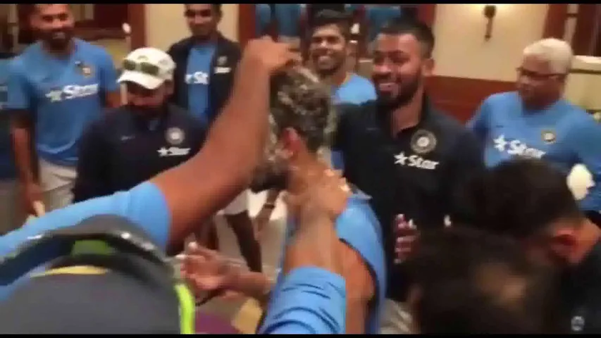 see with whom virat kohli shared first piece of cake