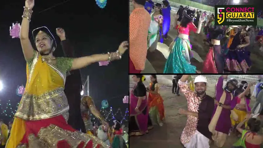 Dancers play garba wearing helmets in Vadodara