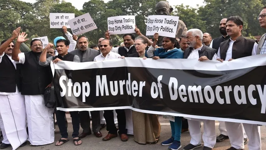 Congress on protest outside Parliament premises against BJP’s move to form govt in Maharashtra