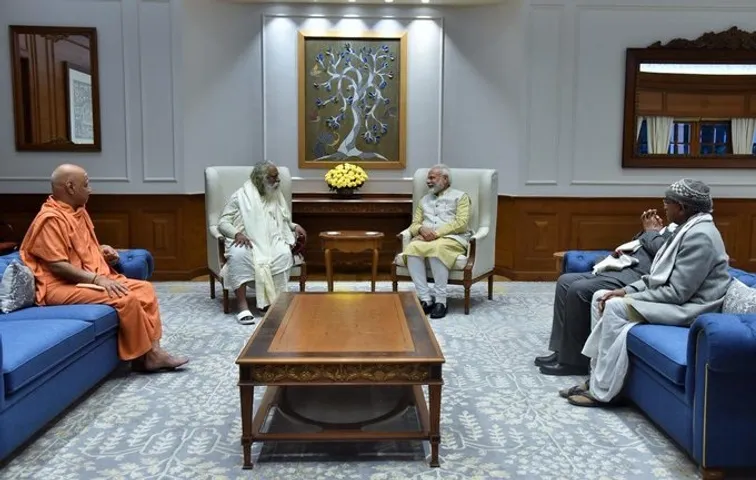 Ram Mandir Trust members meet PM Modi, invite him to visit Ayodhya