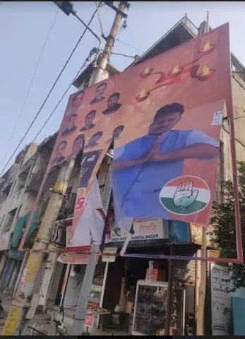 Vadodara Congress leader approach police after someone torn down the hoarding put up at public place