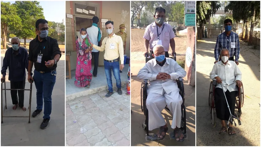 Volunteers help elderly and other voters in casting their votes in Vadodara