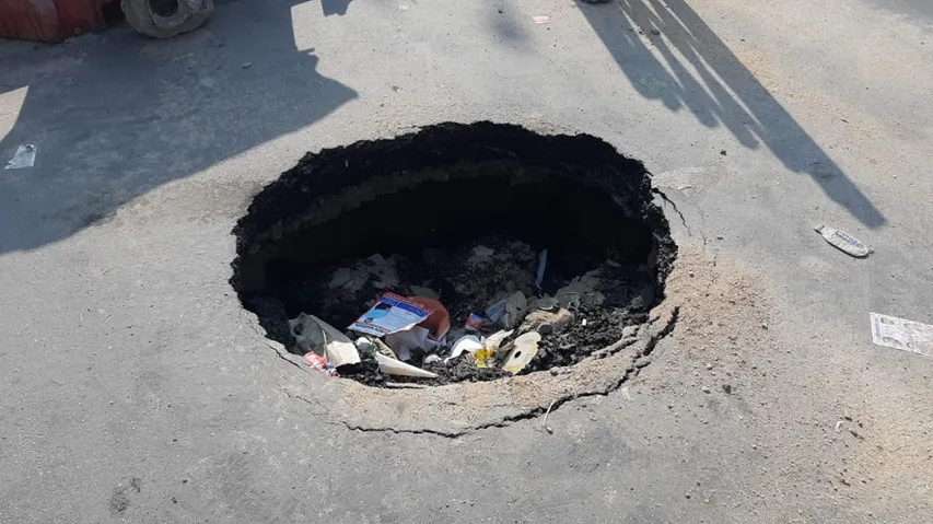 Big pit on road disrupt traffic on Waghodia road on Vadodara city