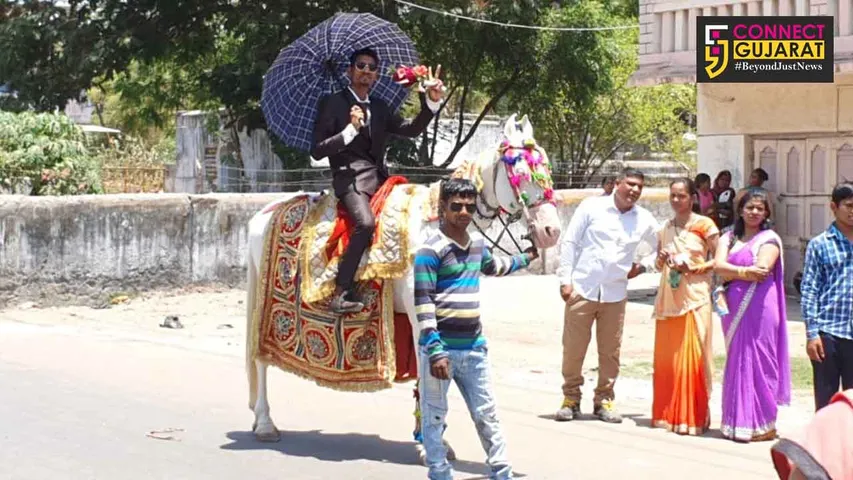 આકરા તાપમાં સંસારમાં પગરણ માંડતા વરરાજાનો છાંયડો બની છત્રી...!