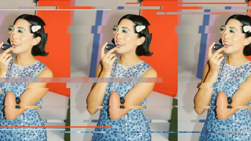 Disabled content creator April Lockhart applying a make-up product that is accessible and an adaptive beauty tool