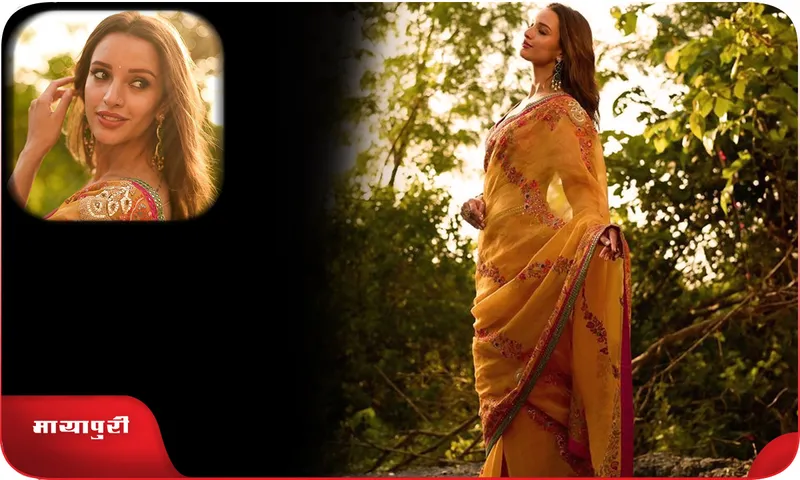 Triptii Dimri stuns with her beauty in a transparent orange saree