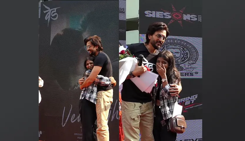 Riteish Deshmukh ने अपनी फिल्म Ved का प्रमोशन करते हुए स्टेज पर एक प्रशंशक के पैर छुए